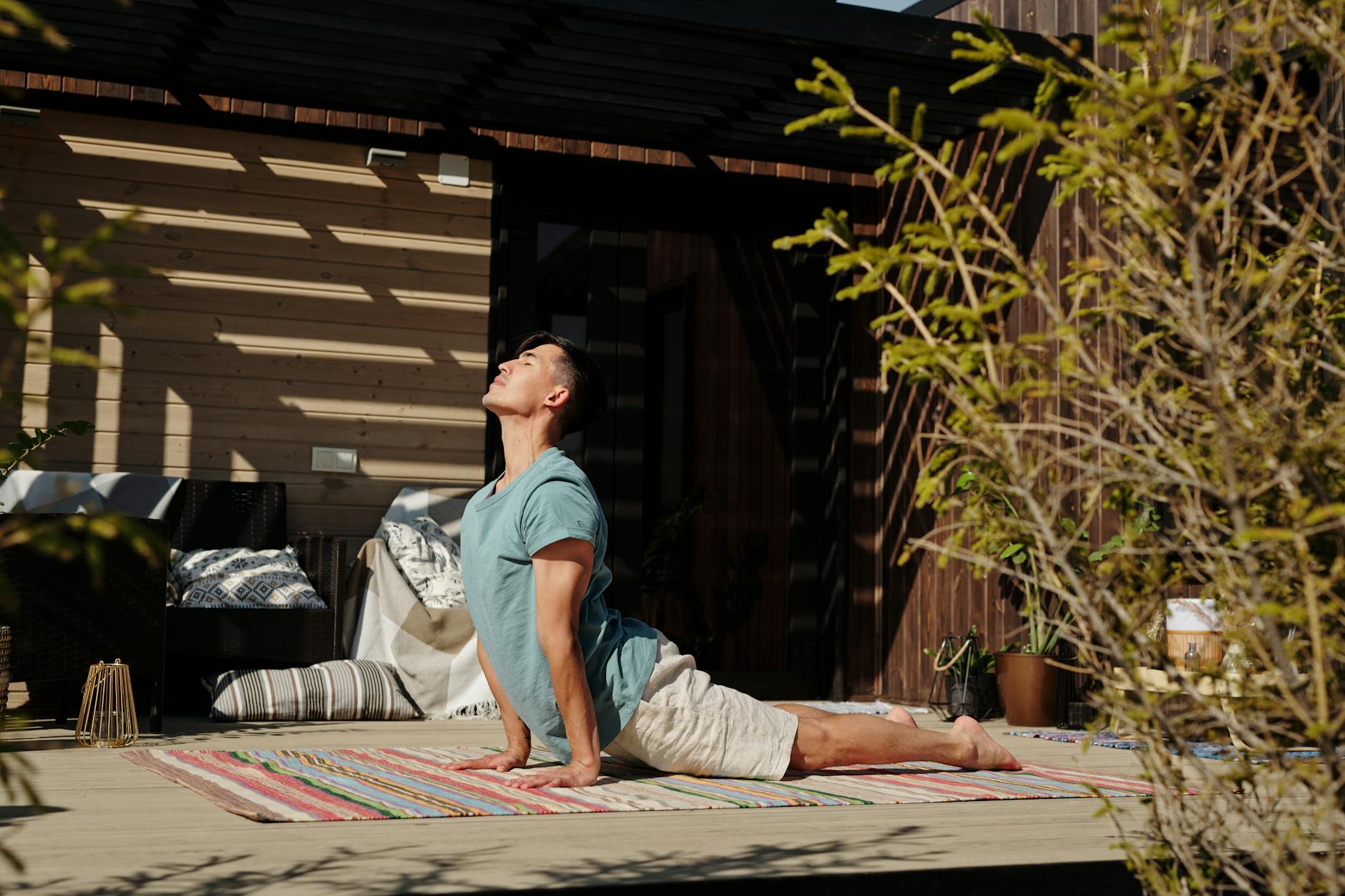 a person doing morning yoga in a serene outdoor setting