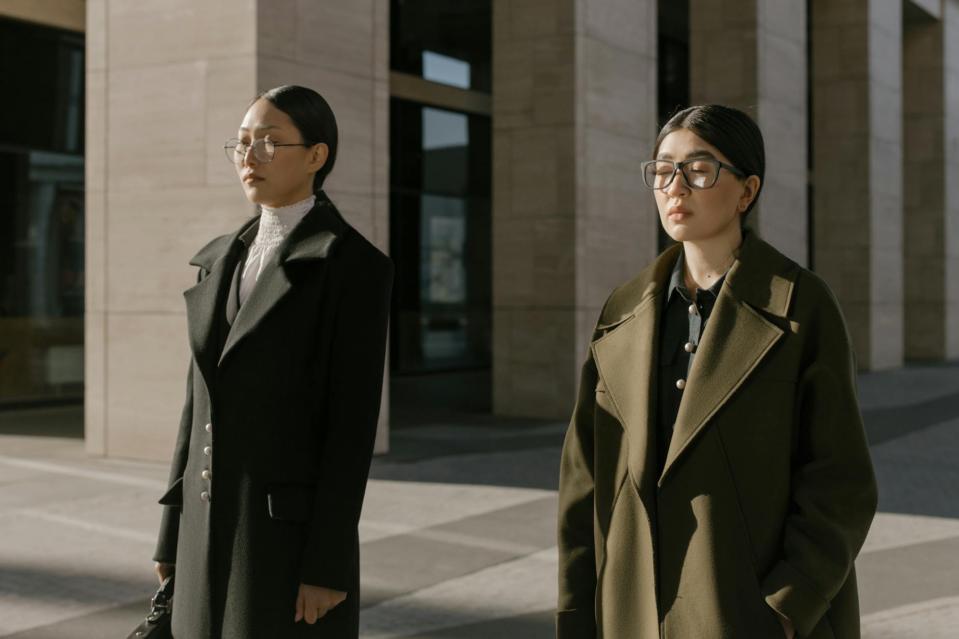 men and women wearing wool overcoats