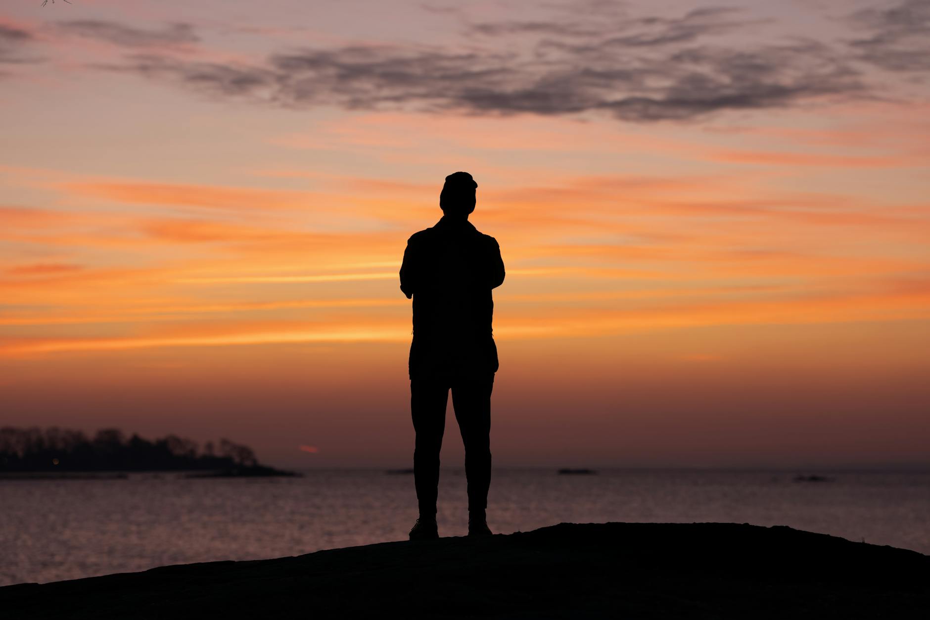 a person looking at a sunset symbolizing new beginnings