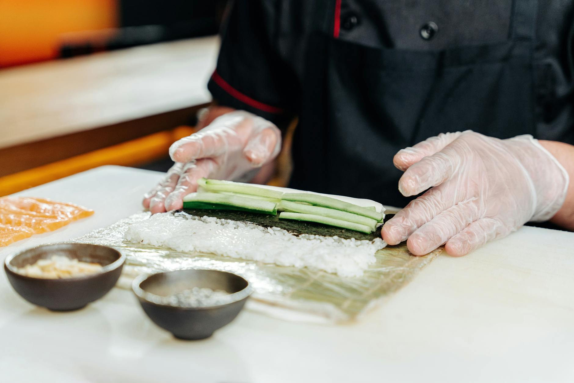 Chef preparing sushi in a traditional Japanese restaurant