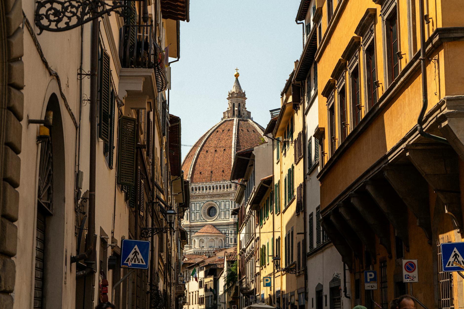 walkers enjoying Florence's historic streets and architecture