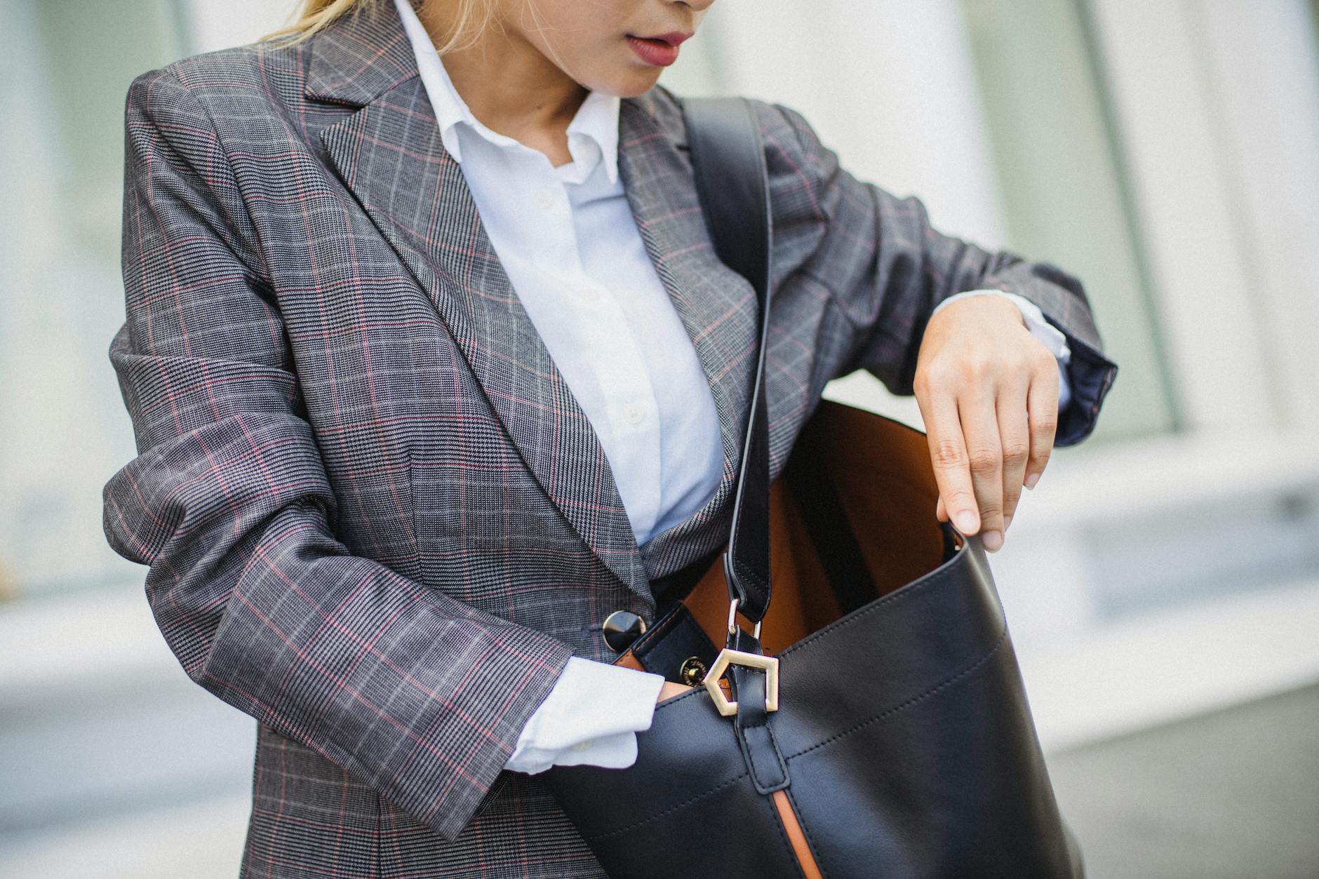 woman styling a blazer with accessories