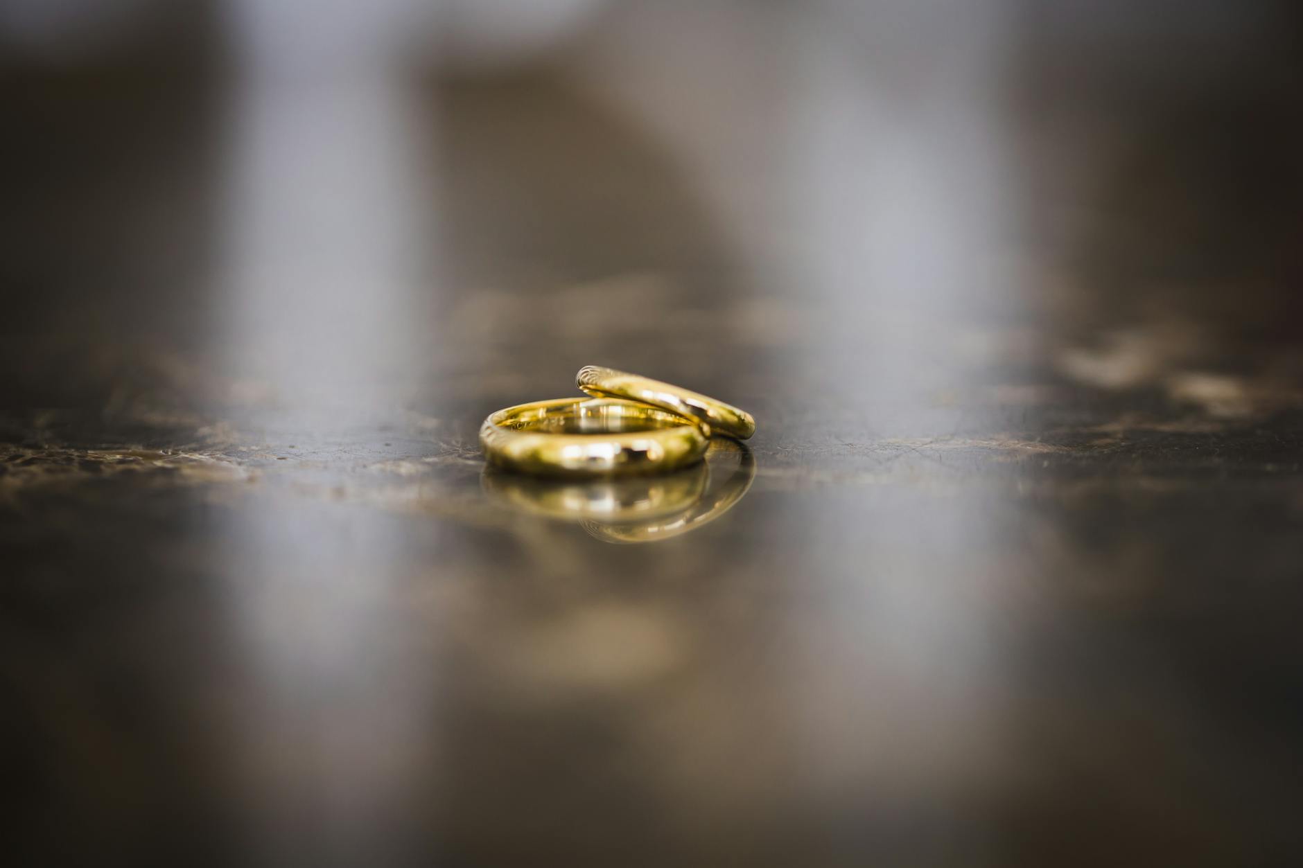 simple gold rings on a marble background