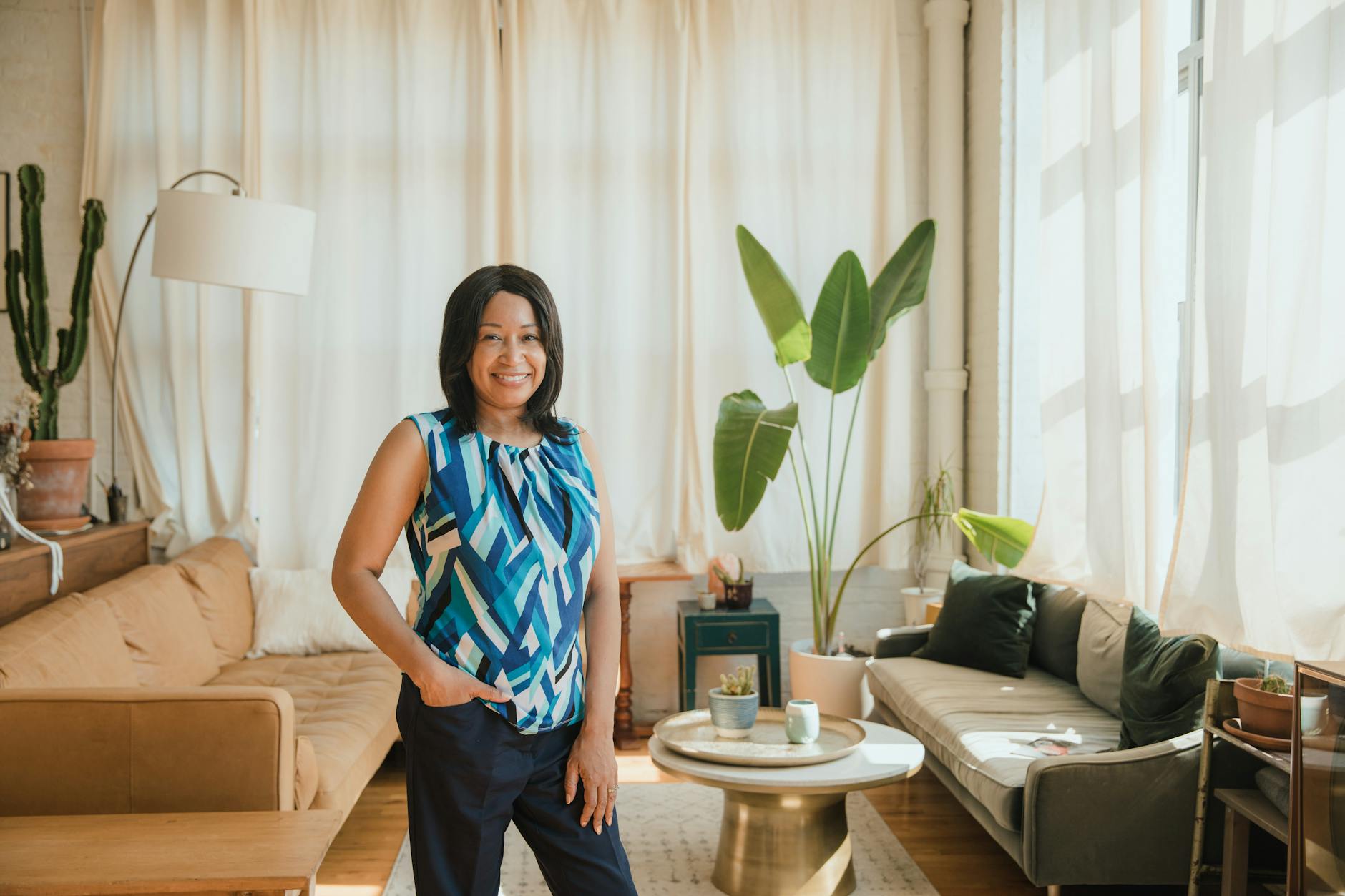 confident person in a well-decorated living room