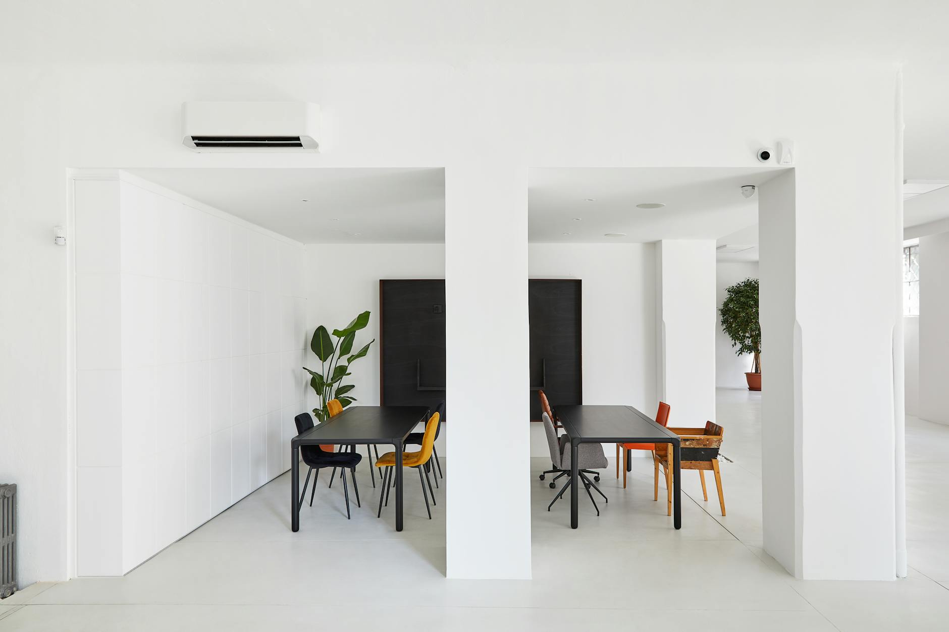 a modern minimalist office space with clean lines and ample natural light