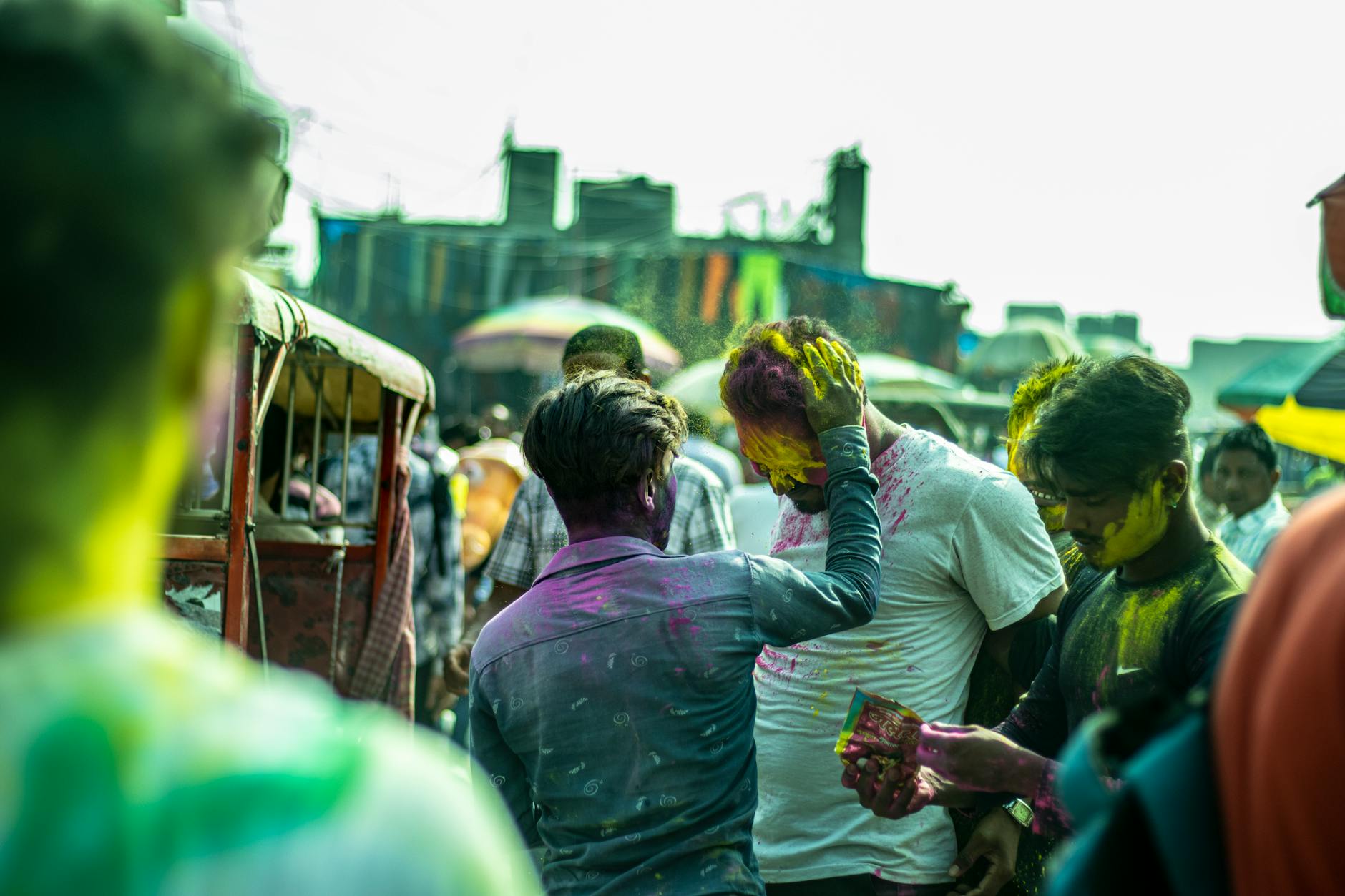 celebration during Holi festival in India, showcasing vibrant colors and joy