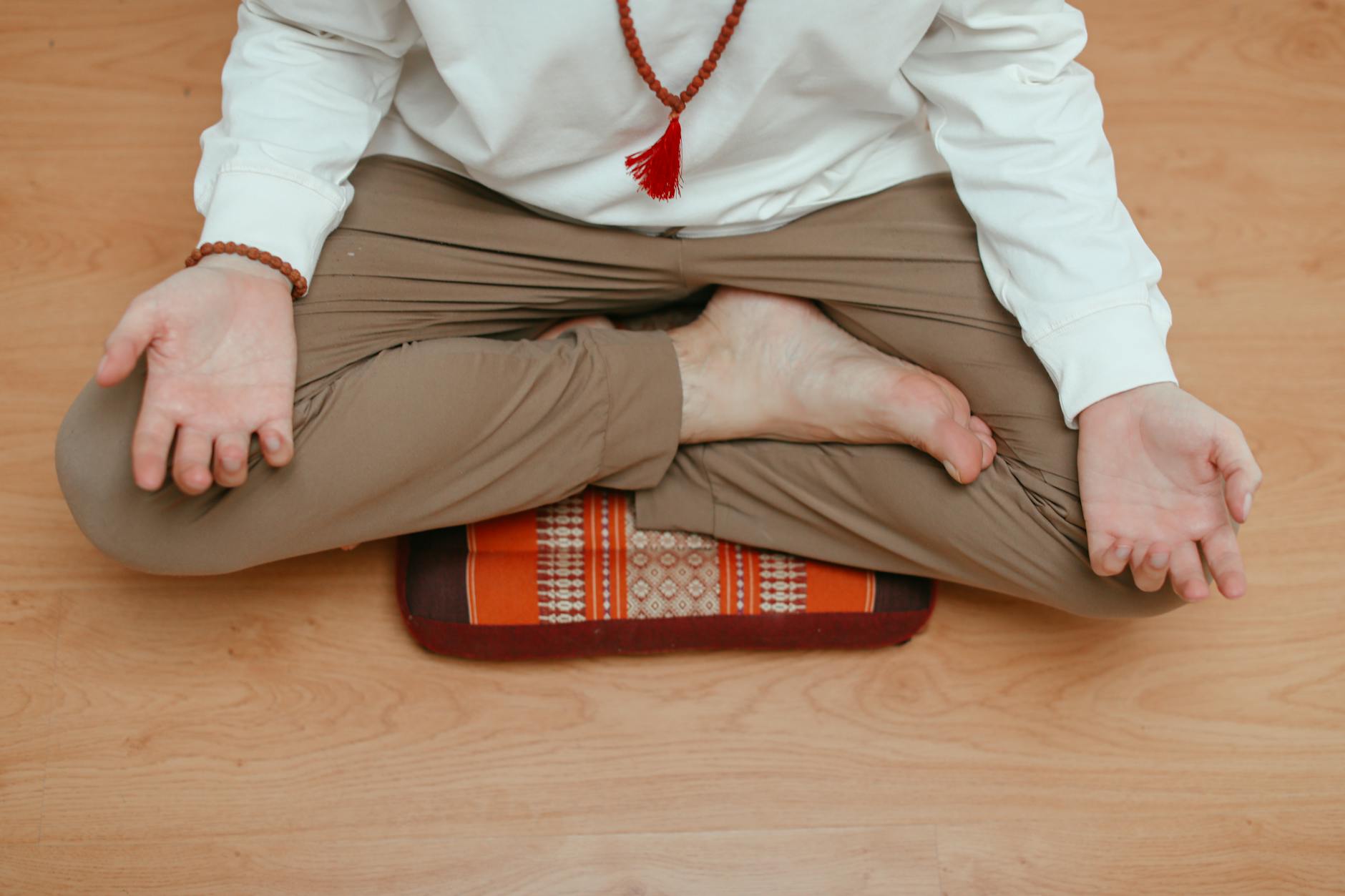 meditative practice with person sitting cross-legged