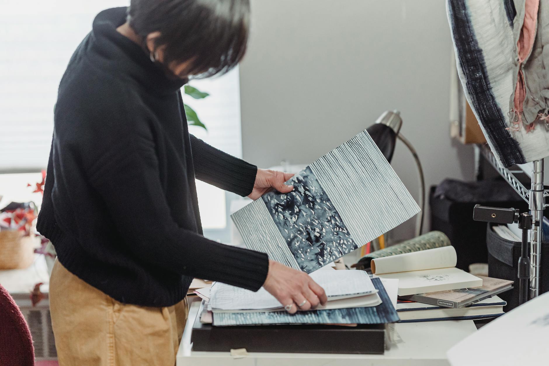 a person organizing cluttered space